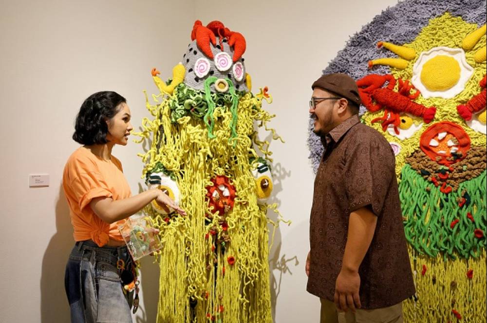 Mangmoel Merajut Makanan Buat Gambarkan Makna Keakraban